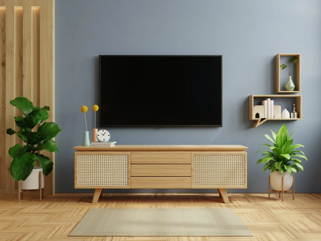 Step-by-step guide on installing a TV wall mount in a modern living room.
